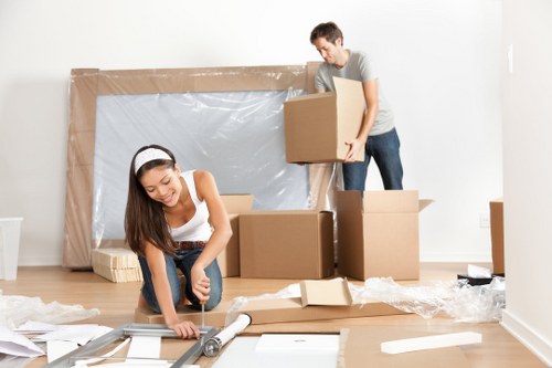 Local commercial movers loading equipment for relocation
