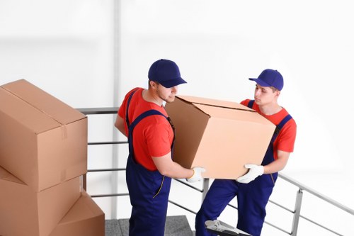 Unpacking boxes into a new Ilford property room by room