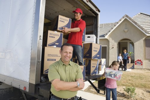 Packed boxes and furniture ready for local removals