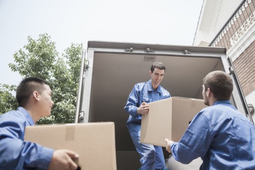 Professional movers handling a local removal service in Ilford