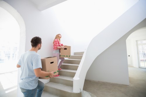 Local moving team handling apartment access and parking in Ilford