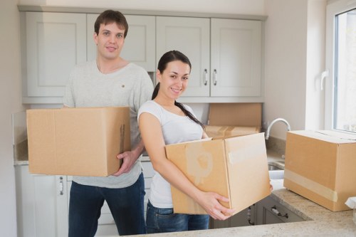 Careful loading of household items for transport in Ilford